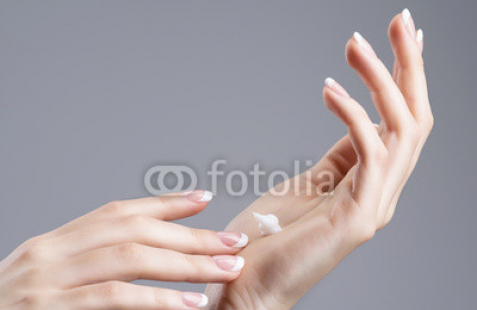 Close-up-female-hands-apllying-hand-cream.jpg